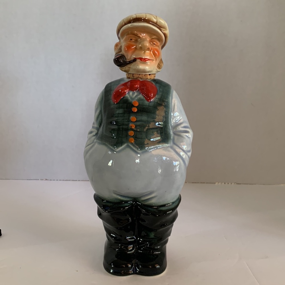 Old seaman gentleman, vintage decanter. Wearing boots, red bow, GERMANY